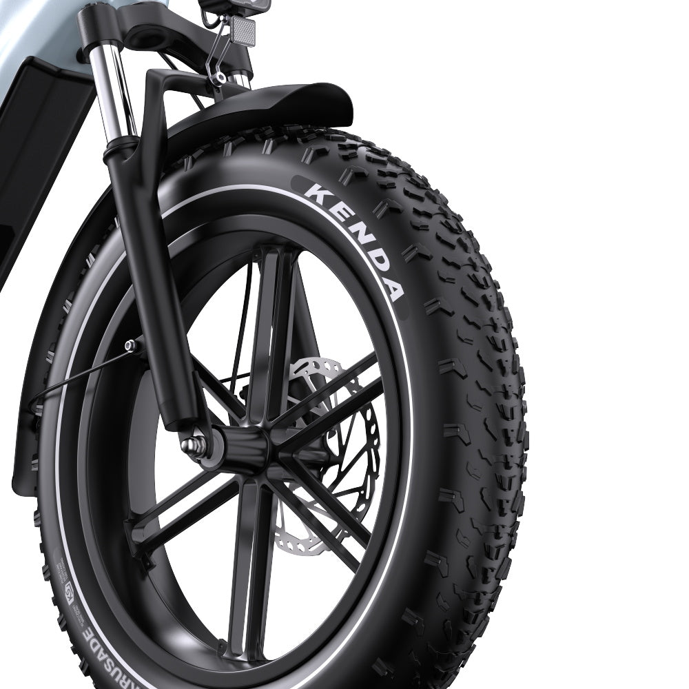 Close-up of a  Onesport OT08 bicycle wheel with Kenda tire on a white background